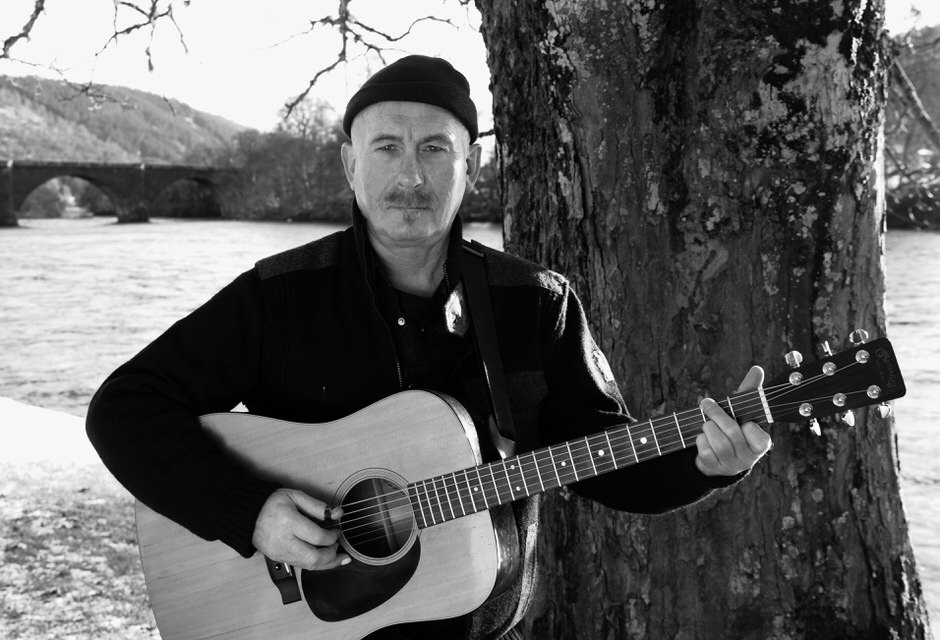Fraser Nimmo plays a Martin guitar